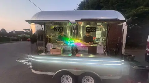 Karen Olejarka The silver food truck with Dexter and his brother inside 