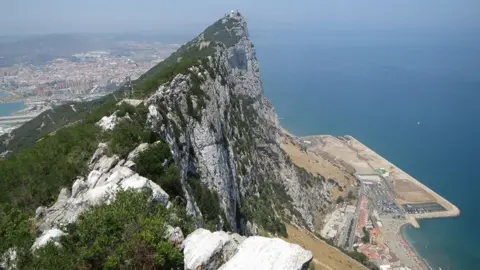 PA Media The Rock of Gibraltar juts out above the sea.