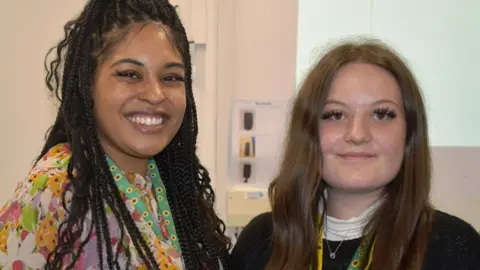 West Suffolk College Lecturer with a student