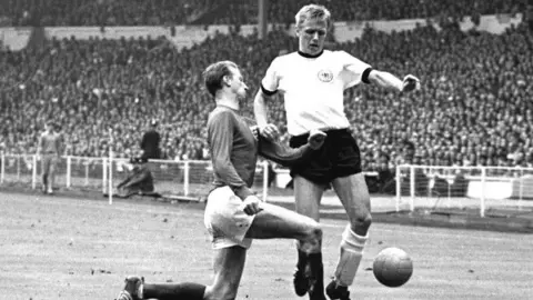 Getty Images Sigfried Held playing in the 1966 World Cup final that his side lost 4-2