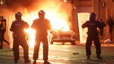 PABrian Lawless An Garda Siochana at the scene in Dublin city centre after five people were injured in an attack, including three young children. V