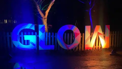 BBC Sign that reads glow