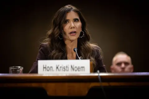 Kristi Noem speaks at a hearing. 
