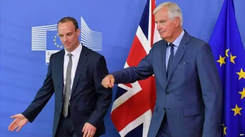 AFP Dominic Raab (left) and Michel Barnier