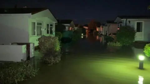 Somerset County Council Floodwater Within Holway House Park In Ilminster