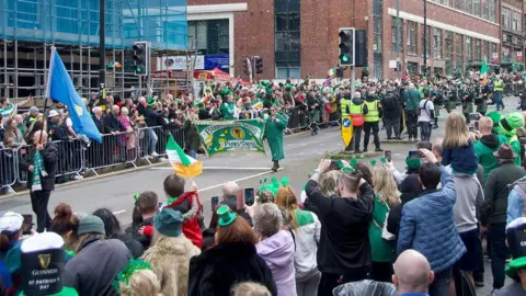 Crowds lined up watching the parade