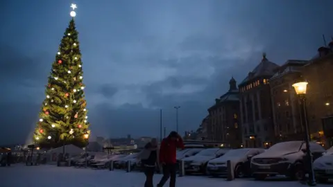 Getty Images The lights of Stockholm's biggest Christmas tree are switched on for the first time during Advent Sunday on November 27, 2016