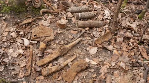 Some of the debris uncovered by looters at the site