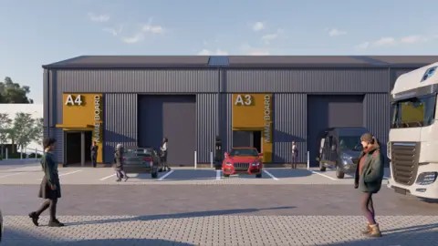 Torridge District Council An artists impression of the business units showing dark grey industrial style units in a row with large sliding doors. 