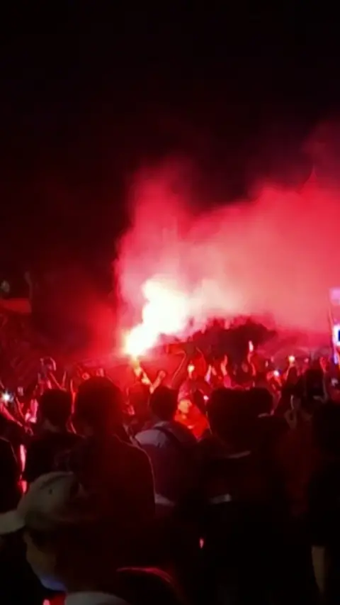 Lights and smoke at the vigil