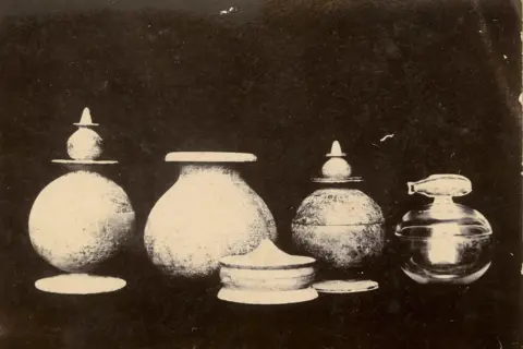 Peppé family Four steatite and one rock crystal reliquaries recovered from the sandstone coffer of the Piprahwa stupa. Indian Museum, Kolkata. Photo courtesy of the Peppé family