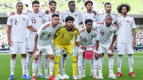Qatar football team posing for team picture