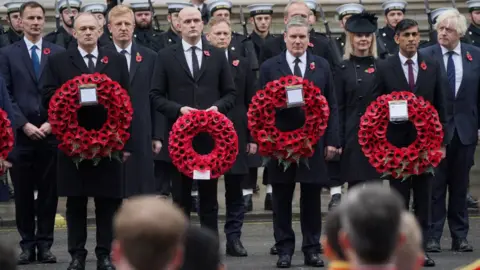 PA Media Chancellor Jeremy Hunt, Liberal Democrat leader Ed Davey, deputy prime minister Oliver Dowden, SNP Westminster leader Stephen Flynn, Defence Secretary Grant Shapps, Labour leader Sir Keir Starmer, former prime minister Liz Truss, Prime Minister Rishi Sunak, and former prime minister Boris Johnson were all present in Whitehall