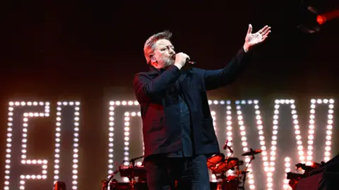 Getty Images Elbow frontman Guy Garvey on stage