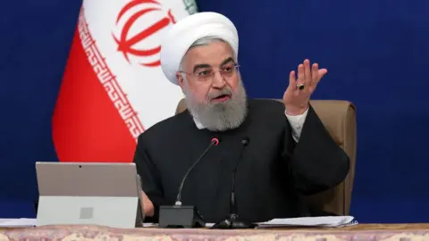 EPA Iranian President Hassan Rouhani speaks at a cabinet meeting in Tehran, Iran (6 January 2021)