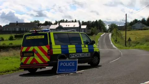 BBC Police close road following crash