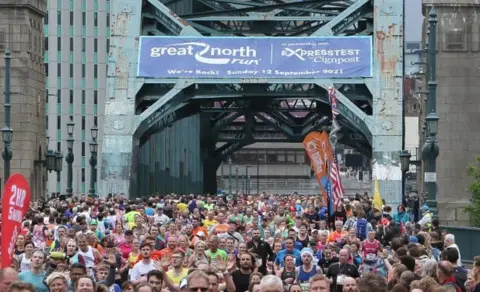 Getty Images Runners across the Tyne Bridge in 2021