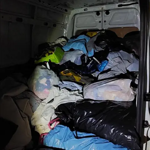 Cambridgeshire Police Bags of clothes found in a van in Cambourne, Cambridgeshire