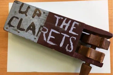 Lancashire County Council Football rattle saying 'Up the Clarets'