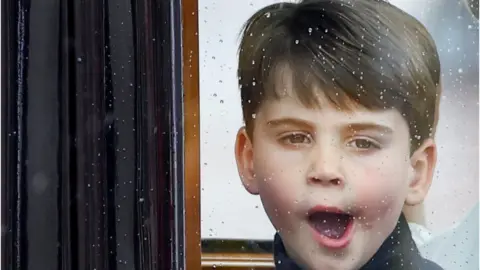 Reuters Prince Louis yawns as he travels in a coach