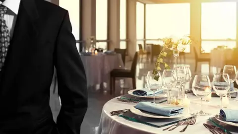 Getty Images waiter and restaurant