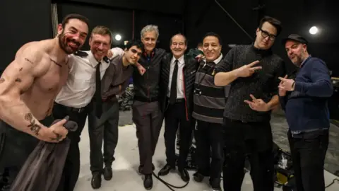 Jailbroken Films A group of actors and film staff in a studio