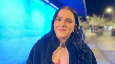 Andy Trigg/BBC Lucy, a clubber, on Prince of Wales Road in Norwich