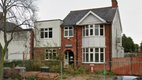 The former surgery is stood empty and surrounded by fencing