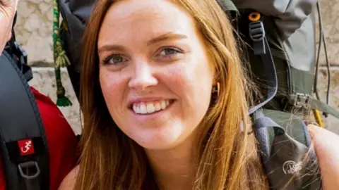 A picture of a woman with auburn hair