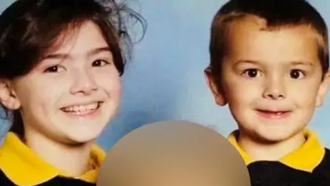 A young girl and boy, Meaghann and William Murphy when they were children, smiling at the camera.