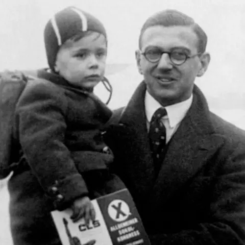  Family handout via Press Association Sir Nicholas with 1  of the children helium  rescued, named Hansi Beck, successful  1939