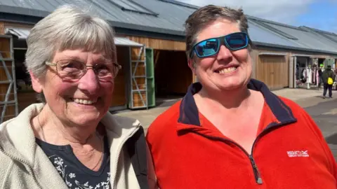 Andrew Turner/BBC Tina Goodman, left, and Mandy Goodman, right, beside Great Yarmouth market