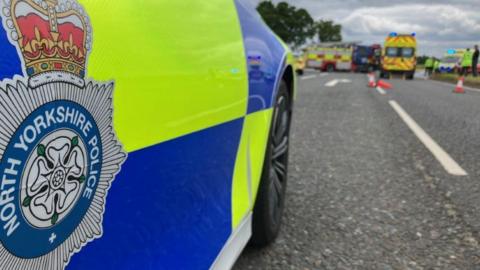 Police attend the scene of a collision on the A19