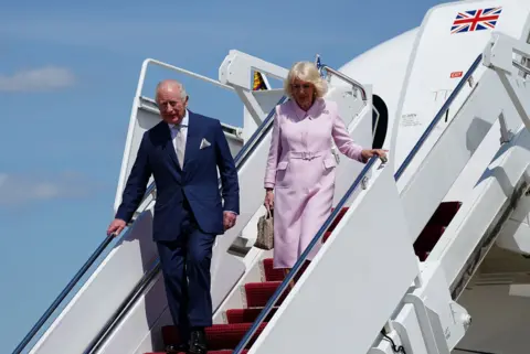 Reuters Britain's King Charles and Queen Camilla disembark the plane on arrival for a state visit to the United States at Joint Base Andrews, Maryland, U.S., April 27, 2026.