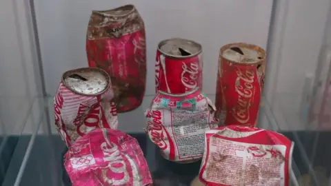 Mike Liggins/BBC Coca-Cola cans