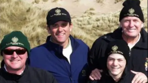 Neil Hobday Neil Hobday (far left) with Donald Trump (far right) during his first visit to Aberdeenshire in 2006