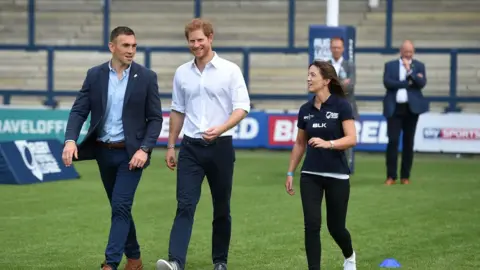 PA Media Prince Harry with former Leeds Rhino rugby league player Kevin Sinfield in 2017