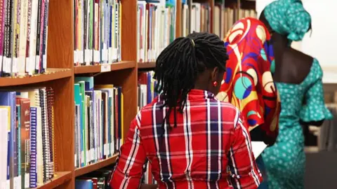 AFP Three teenagers who escaped a Boko Haram mass kidnapping in the northeast Nigerian town of Chibok last year are seen at the American University of Nigeria, in the Adamawa state capital, Yola, Nigeria - 8 May 2015