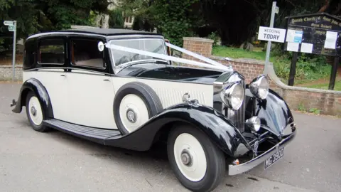 EPA Rolls Royce vintage car with wedding ribbons