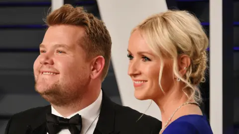 Getty Images James Corden with his wife Julia Carey