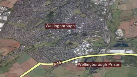 Map showing Wellingborough Prison in the south of the town, off the A45.