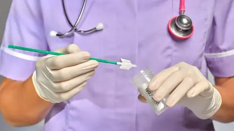 Getty Images Medical staff with smear test