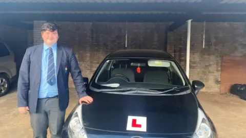 family photo Harry Nicholls with his new car