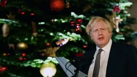 EPA Boris Johnson at a Christmas market outside Downing Street