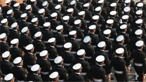 EPA India's Coast Guard Marching Contingent marches during the 71st Republic Day celebrations in New Delhi, India, 26 January 2020.