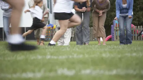 Getty Images Children compete in a race