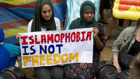 Getty Images Women in London protest against a burkini ban in France