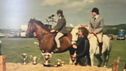 Ray Atwell Lily Gibbs awarding trophies in 1976