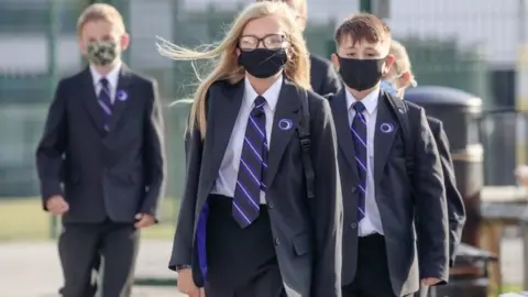 PA Media Children in masks