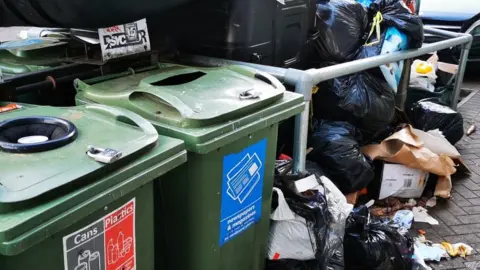 Emma Reynolds Rubbish piled up